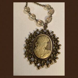 Brown cameo lady it’s beautiful crystals bronze chain necklace.